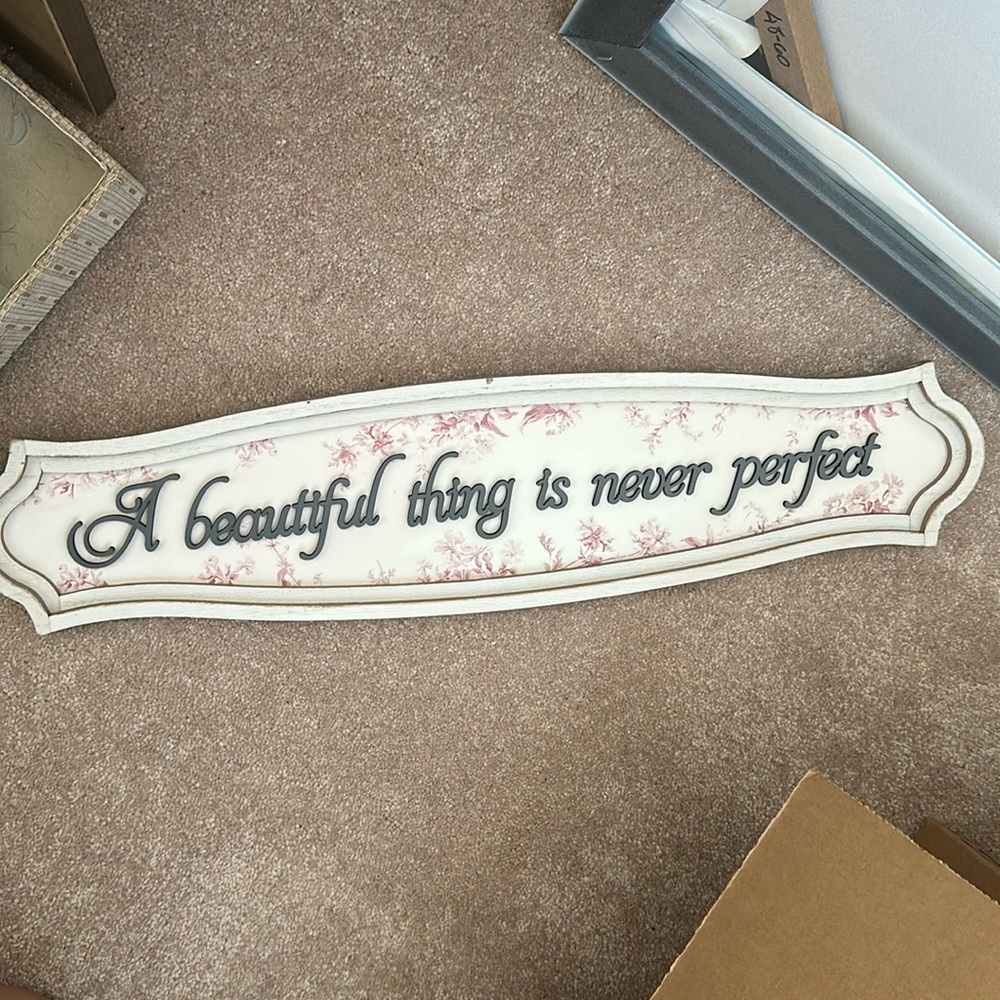 A beautiful thing is never perfect sign
